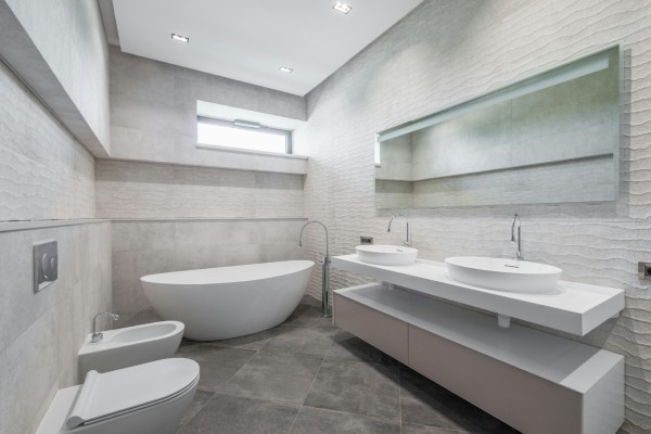 Luxury bathroom renovation in Wollongong with bespoke vanity and tiled shower